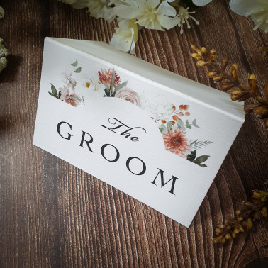 Luxury folded taupe wedding place cards with guest names, perfect for classic and modern wedding receptions.