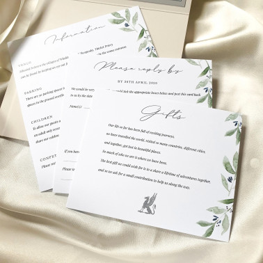 Matching wedding information, RSVP and gift insert cards for the ivory pocketfold wedding invitation.