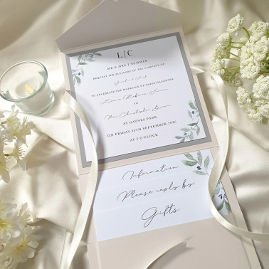 Complete ivory pocketfold wedding invitation suite with invitation, RSVP, information and gift cards.