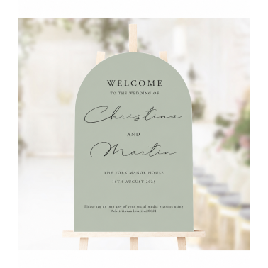 Personalised sage green arched wedding welcome sign, featuring elegant script lettering for a stylish modern UK wedding.