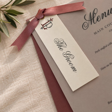 Beautiful personalised wedding menus featuring timeless typography for a sophisticated table setting.