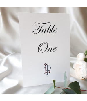 Luxury dusky pink wedding table name card with elegant personalised design.