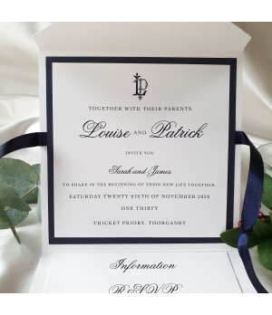 Luxury wedding stationery set in navy blue with layered invitation pocket and matching inserts