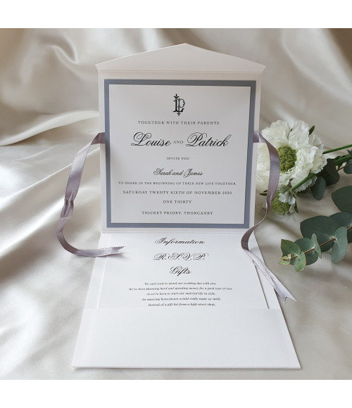 Luxury UK wedding invitation folder in silver design with sophisticated modern typography and clean layout