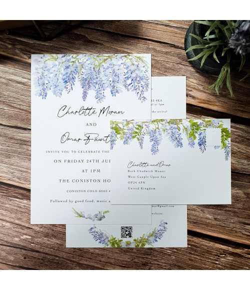 Botanical wedding stationery sample with purple Wisteria flowers and green vines.