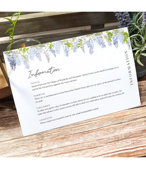 Wisteria wedding invitation with white ribbon, floral design and textured card