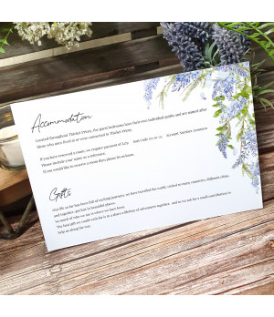 Wisteria wedding invitation with white ribbon, floral design and textured card