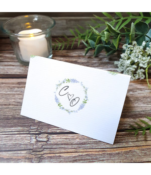 Personalised wedding place name card with romantic wisteria floral artwork.