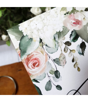 Personalised wedding place name cards featuring blush pink roses and delicate botanical details