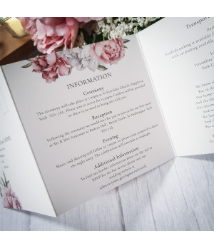 Custom wedding invitation featuring blush pink peonies, designed to create a beautiful first impression for your wedding day.