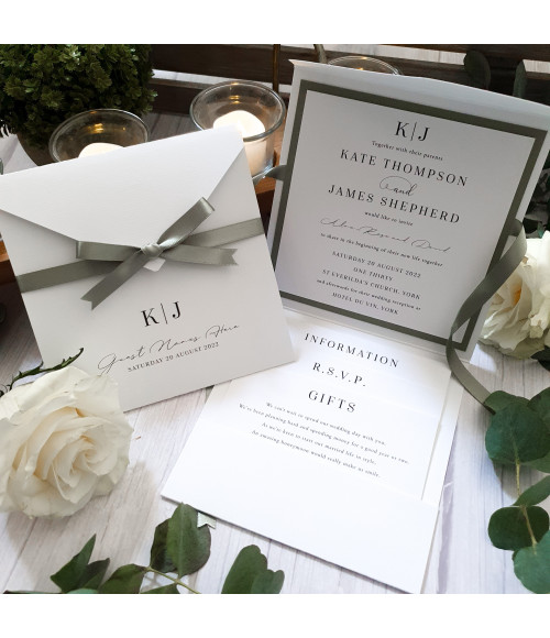 Luxury sage green wedding invitation suite featuring personalised monogram and elegant modern design