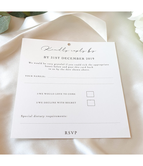 Elegant script font printed on premium pearl white wedding stationery