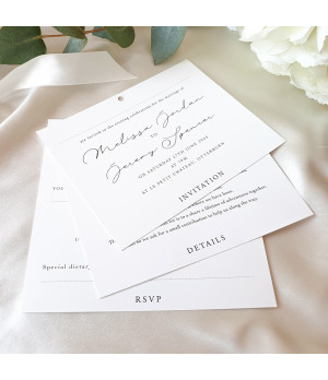 Romantic ivory wedding invite with satin ribbon and refined design