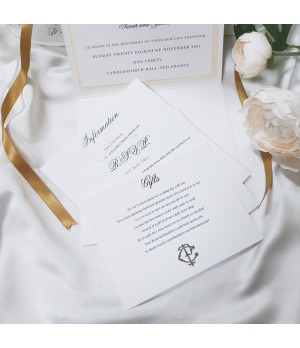 Layered gold and cream wedding invitation set with premium card stock, satin ribbon and coordinated inserts